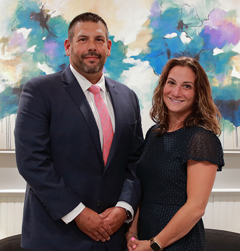 RobChristineStand-H-Cropped-V-480-032825 long island new york divorce lawyers Robert E. Hornberger, Esq. and Christine M. Verbitsky, Esq. are partners in the Long Island Divorce Law Firm Hornberger Verbitsky, P.C.