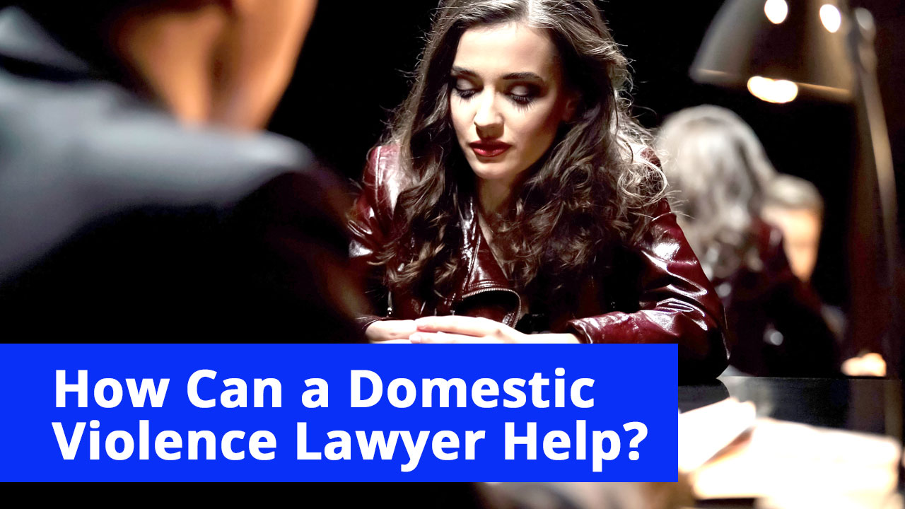 What-is-a-domestic-violence-lawyer Woman seated across from domestic violence lawyer discussing case.