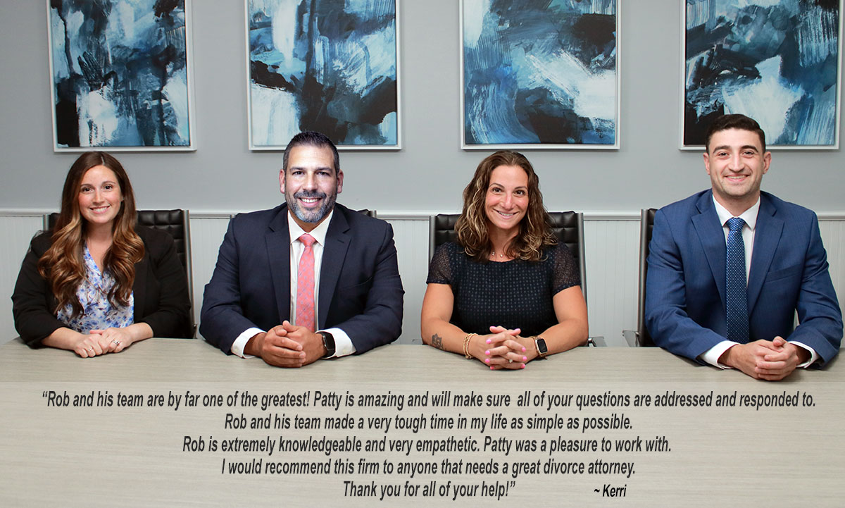 GroupSitting-Edit-1200-testimonial-edit-adjust-1225 divorce lawyers of Hornberger Verbitsky, P.C. sitting at conference table